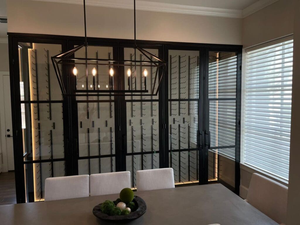 Wrought Iron Framing with Modern Glass Door